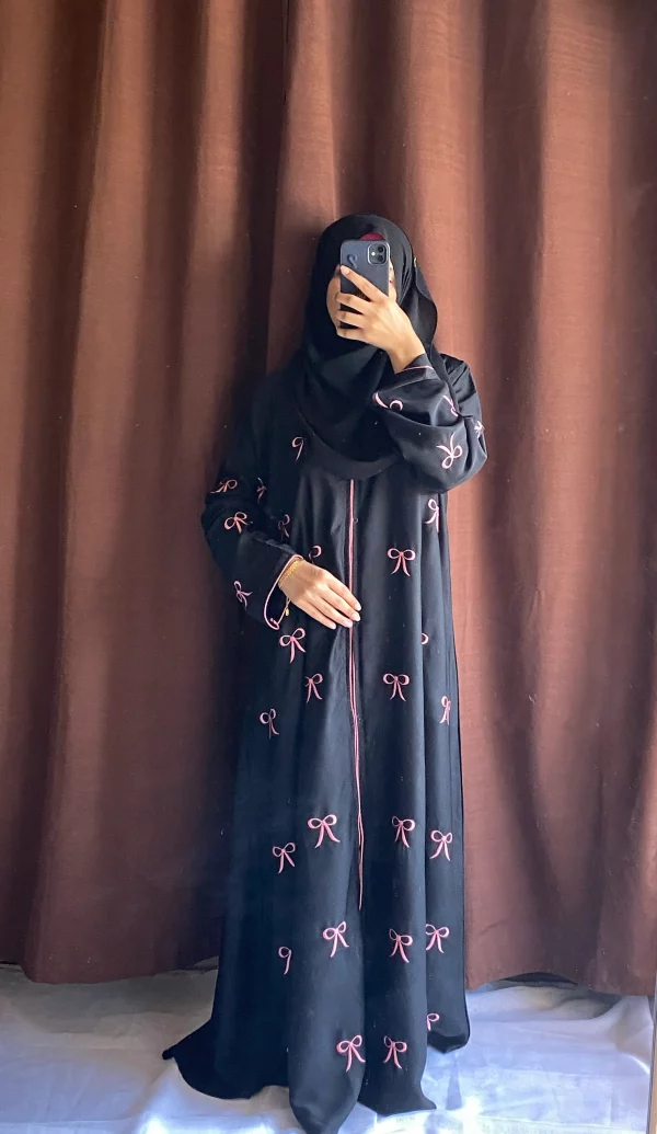 elegant pink bow embroidered black abaya.